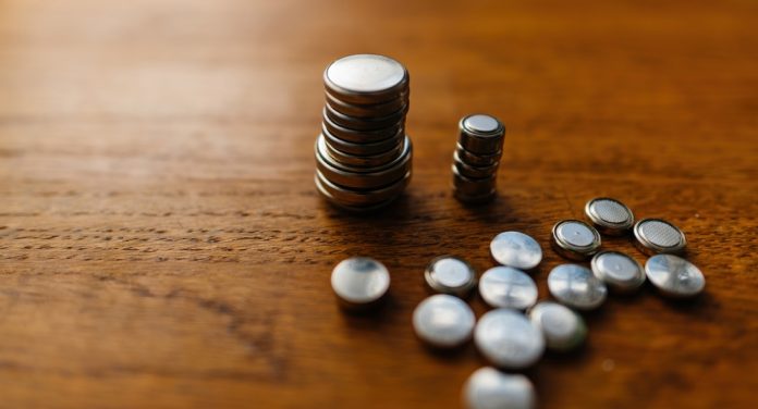Button,Cell,Batteries,Arranged,In,A,Stack,Forming,A,Complex