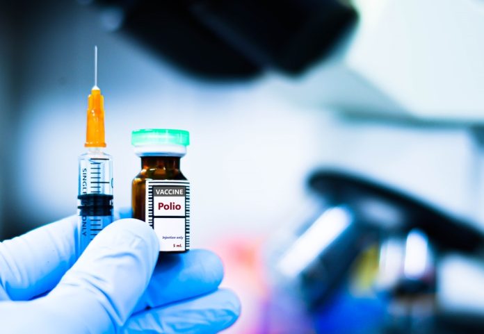 Vaccine,Bottles,And,Syringes,For,Injection,Preventing,Polio,Virus.